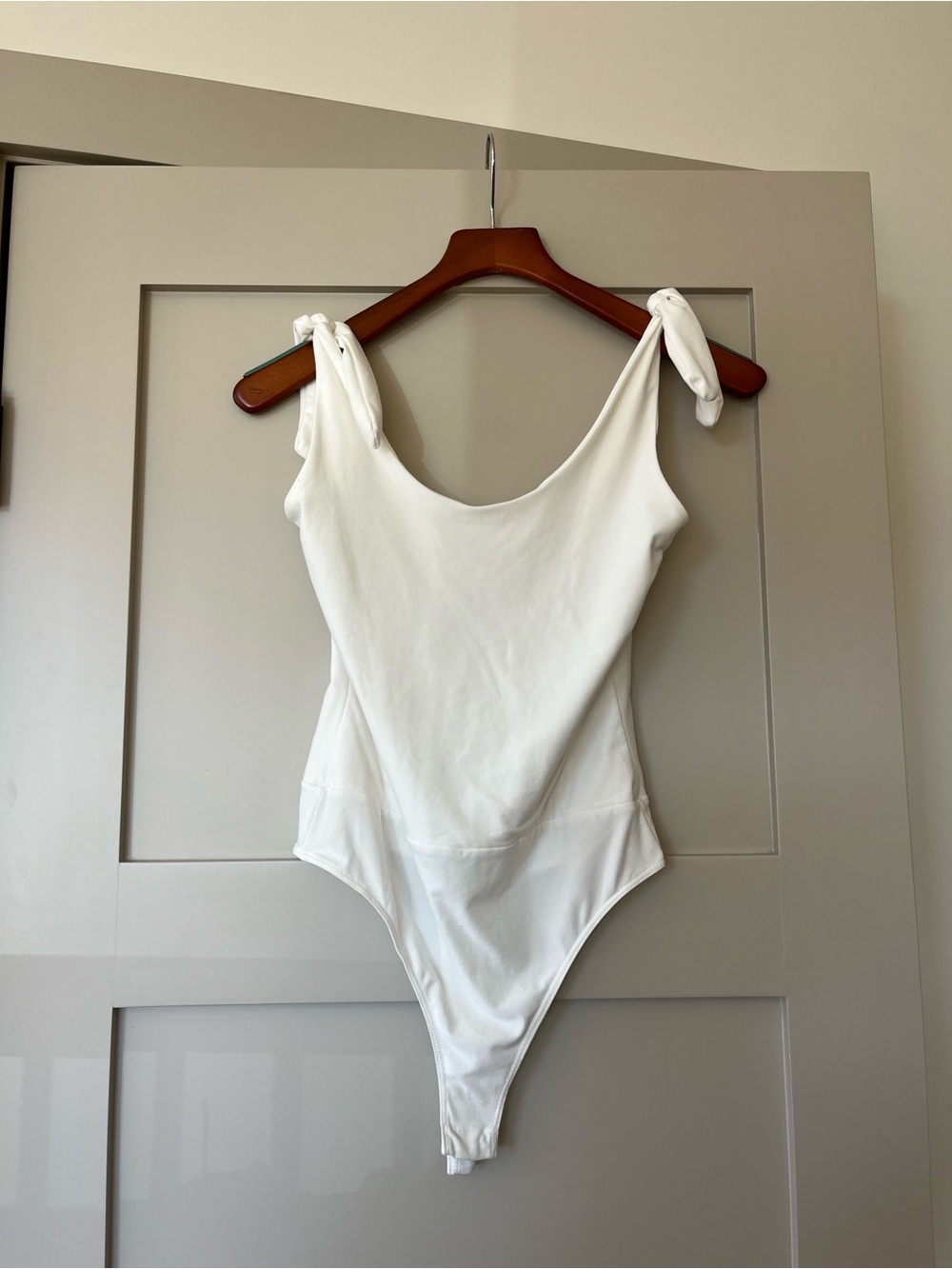 Lulu's White Tie-Shoulder bodysuit